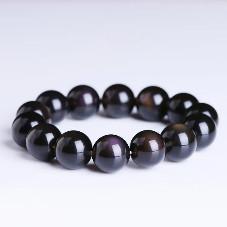 Polished crystal Pi Xiu bracelet with ice stone beads on wrist