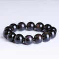 Polished crystal Pi Xiu bracelet with ice stone beads on wrist