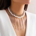 Double-layer imitation pearl tassel necklace with iron pendant and ball bead chain in white K colour