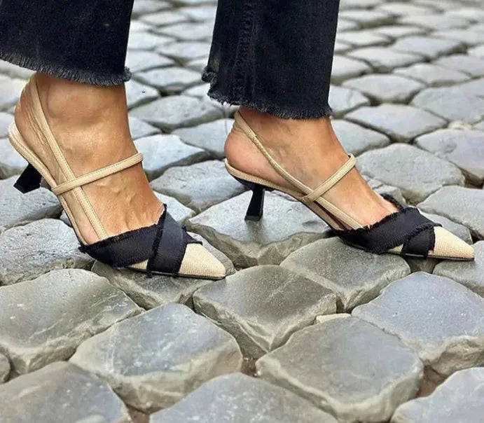 Apricot black colour block women's stiletto sandals with a pointed toe and buckle fastening.