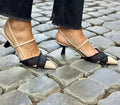 Apricot black colour block women's stiletto sandals with a pointed toe and buckle fastening.