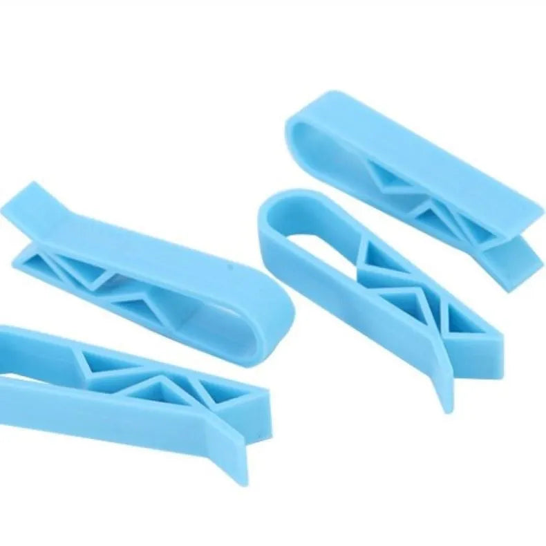 White PP plastic non-slip clip for holding a garbage bag onto a rubbish bin.