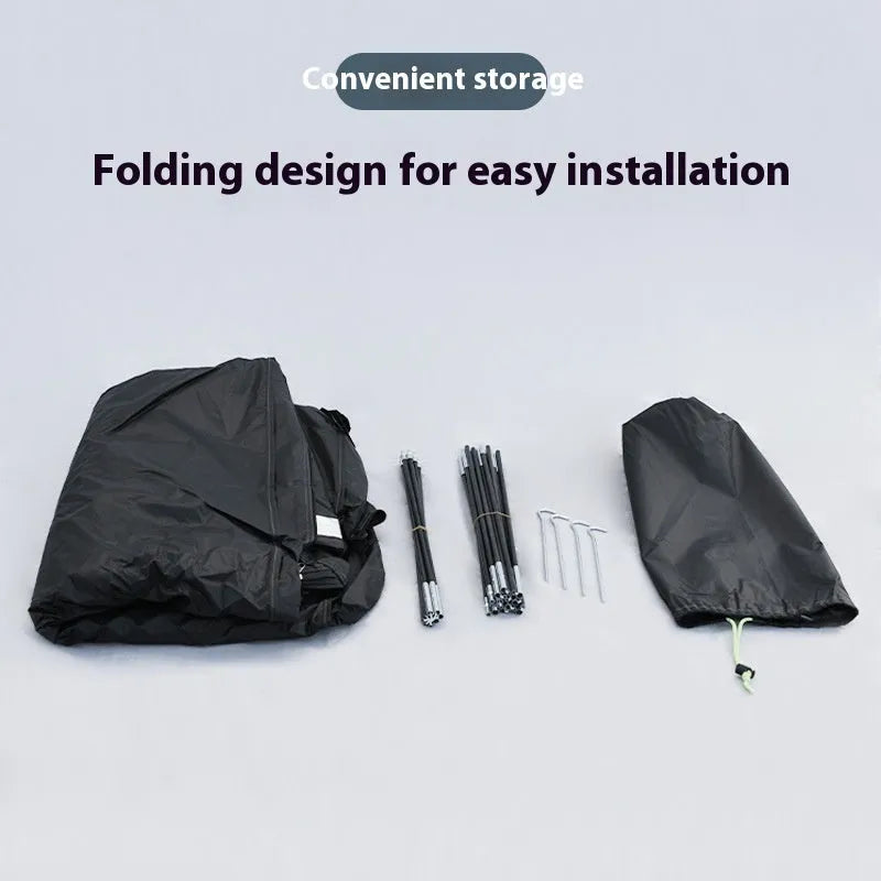 Large black outdoor bicycle storage tent sheltering multiple bikes