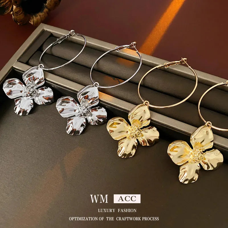 Silver Needle geometric flower design drop earrings in gold or silver electroplated metal alloy
