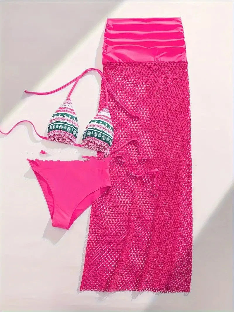 Women's three-piece swim set with bikini and long fishnet skirt in a gradient pattern.
