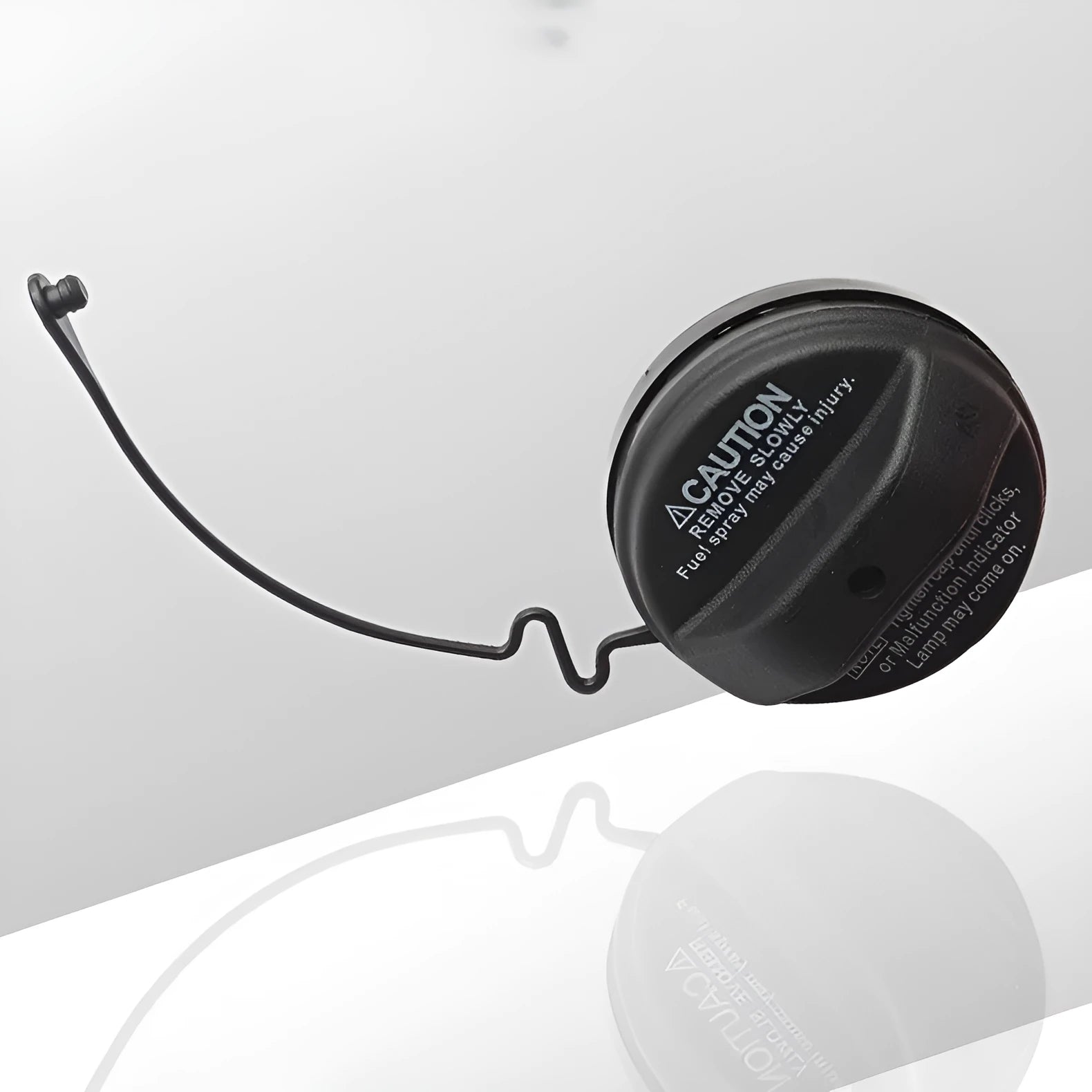 Black plastic Toyota fuel tank cap with snap-type fitting mechanism
