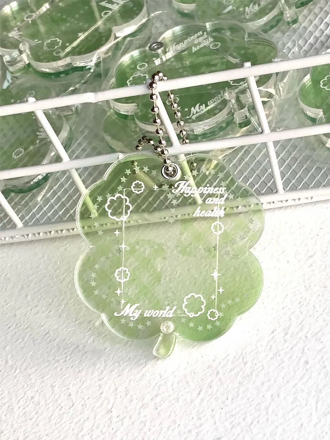 Acrylic four-leaf clover phone pendant keychain in blue, green, or mint