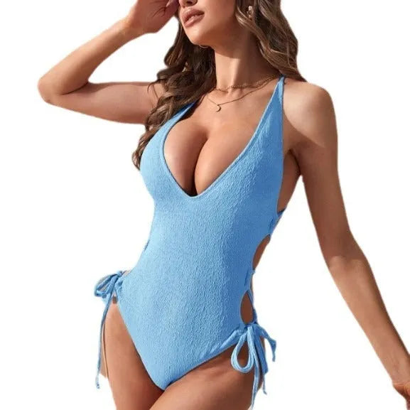 Women's black hollow backless one-piece tether bikini made from polyester fabric
