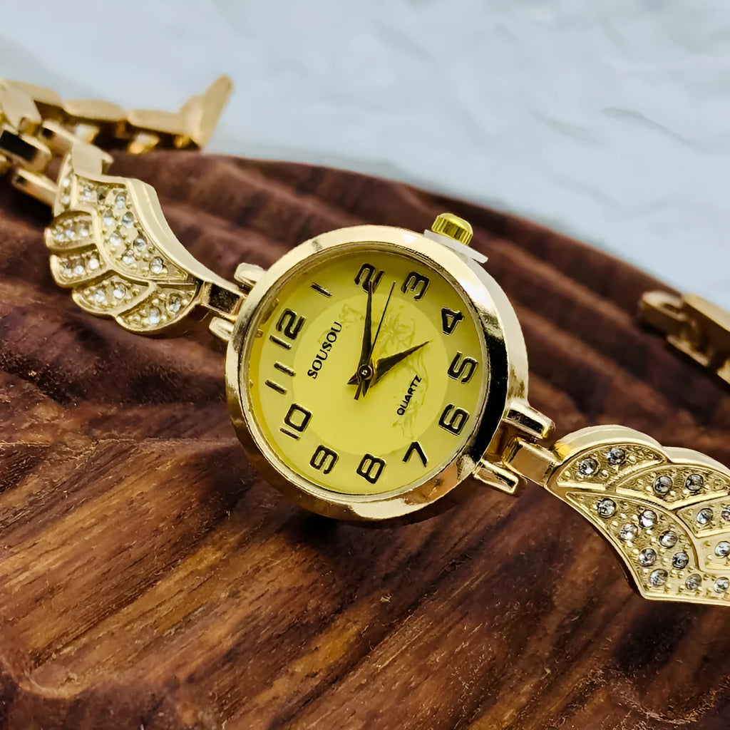 Women's stainless steel watch with a round dial shown in gold, black and gold, and white and gold colour options