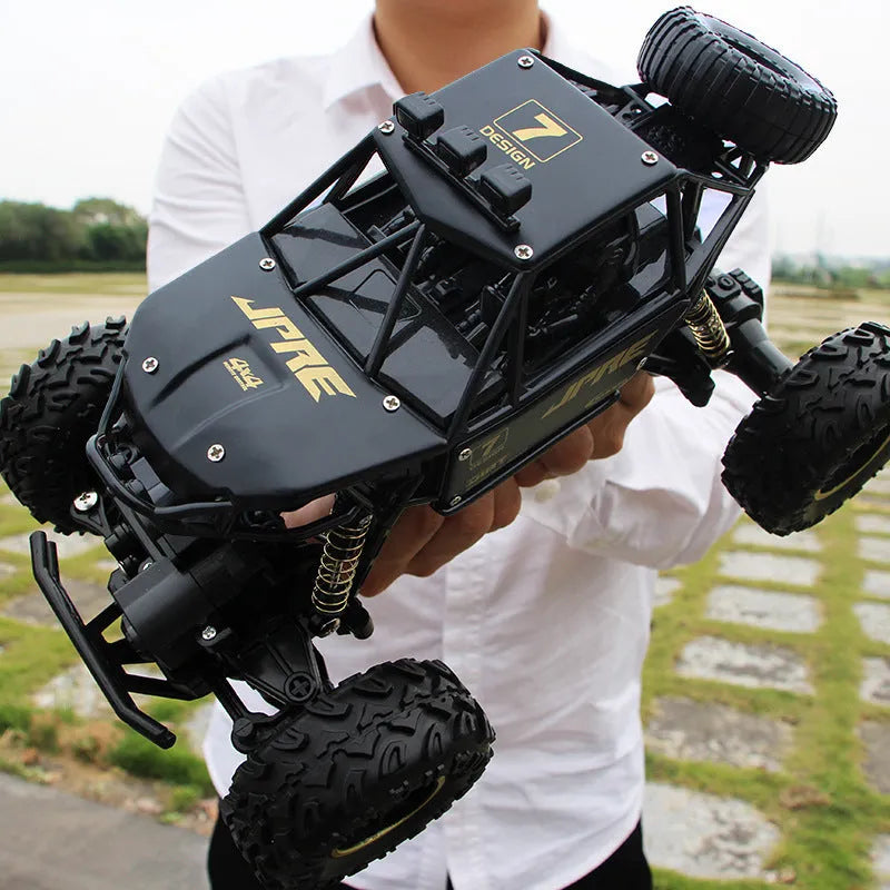 Large black 4WD off-road remote control climbing car with 2.4G wireless remote