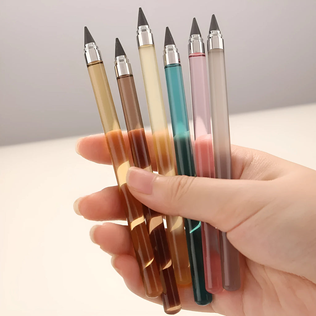 Clear acrylic sharpening-free eternal pencil with alloy tip on a desk
