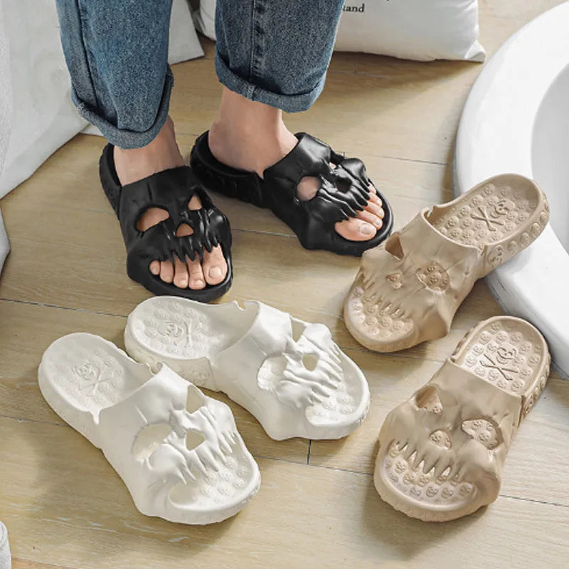 Khaki personalised skull design EVA slippers on a tiled floor, unisex Halloween flip-flops for indoor outdoor use