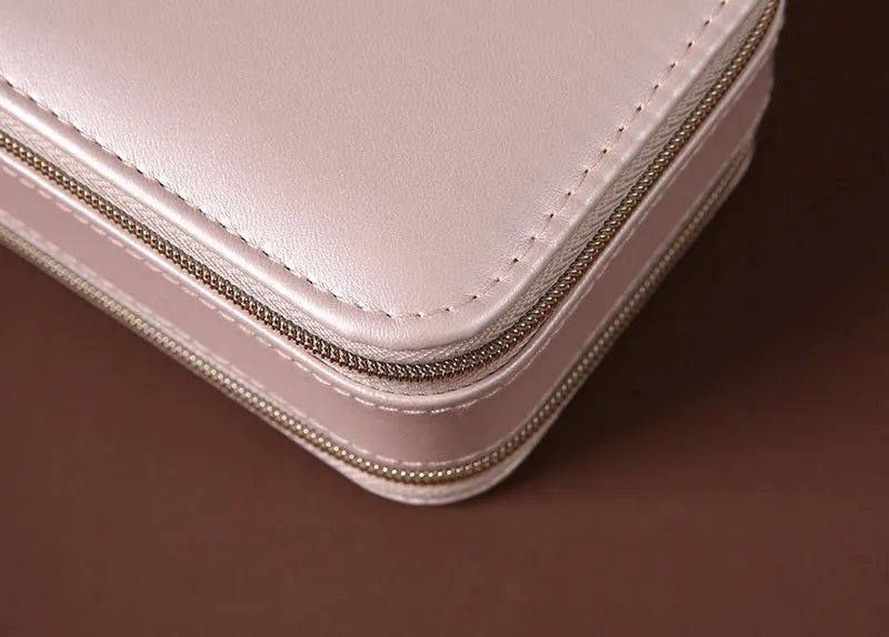 Portable double-sided travel jewellery box in blue with PU leather exterior and pearl velvet lining