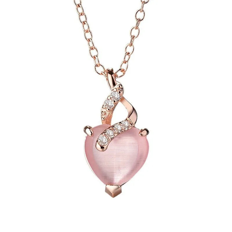 Rose gold heart necklace with pink artificial crystal pendant on cross chain