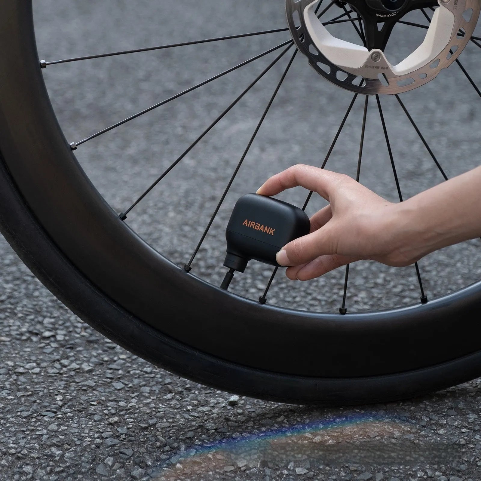 Black AS100 mini electric blast pump for mountain bike tyre inflation with USB charging cable