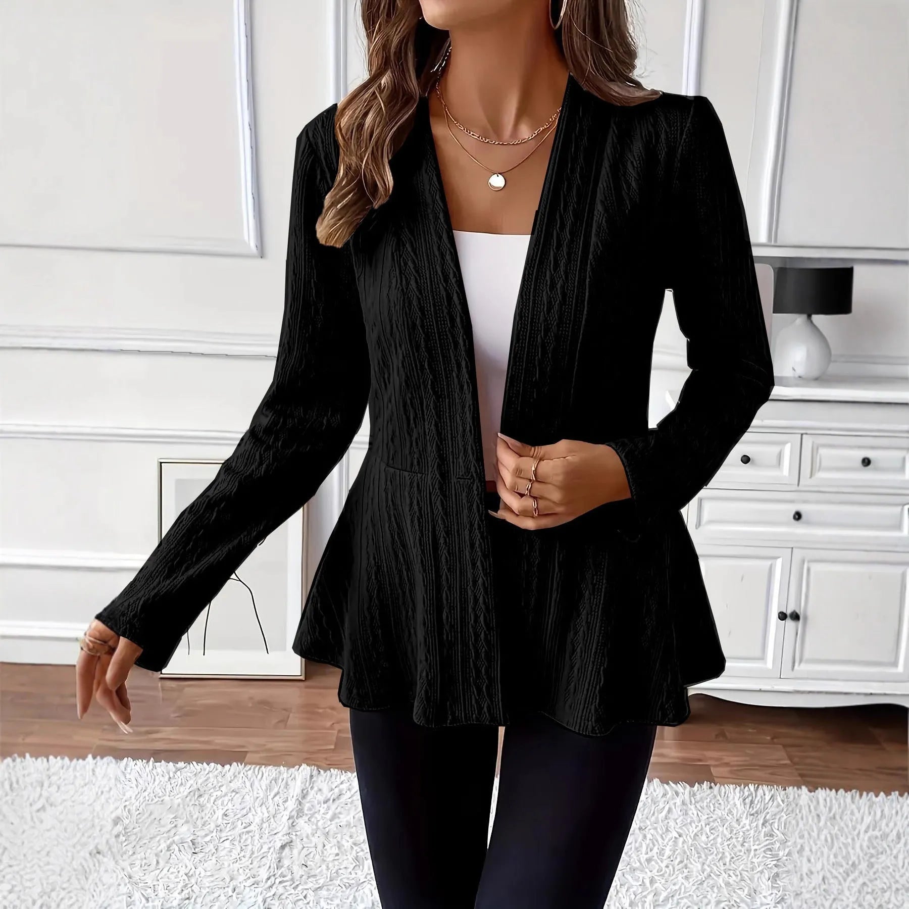 Women's apricot coloured knitted cardigan with one button and a textured Jacquard pattern