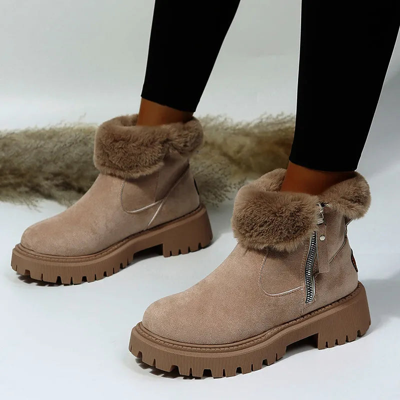 Women's black faux suede high-top snow boots with a side zipper and thick plush lining.