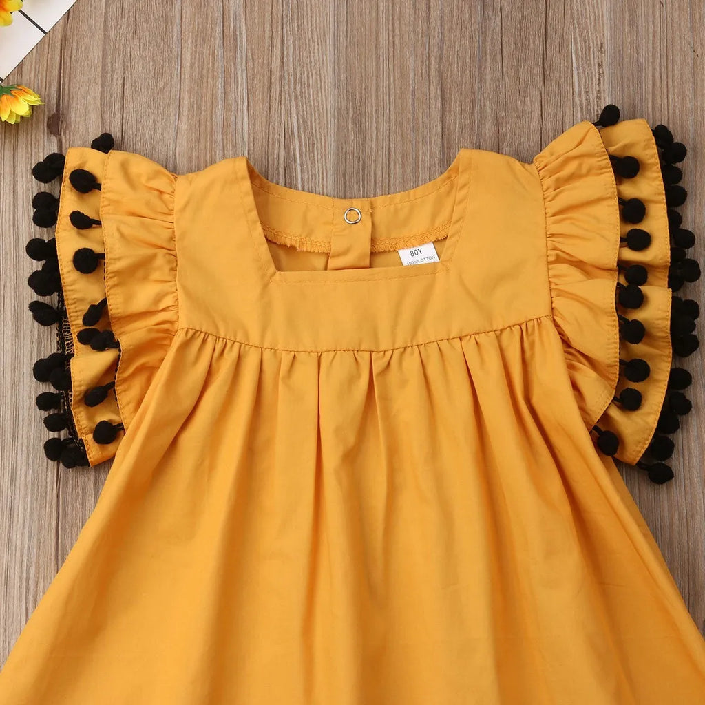 Sleeveless orange girls dress for children ages 3 months to 14 years, sizes 12M to 5T