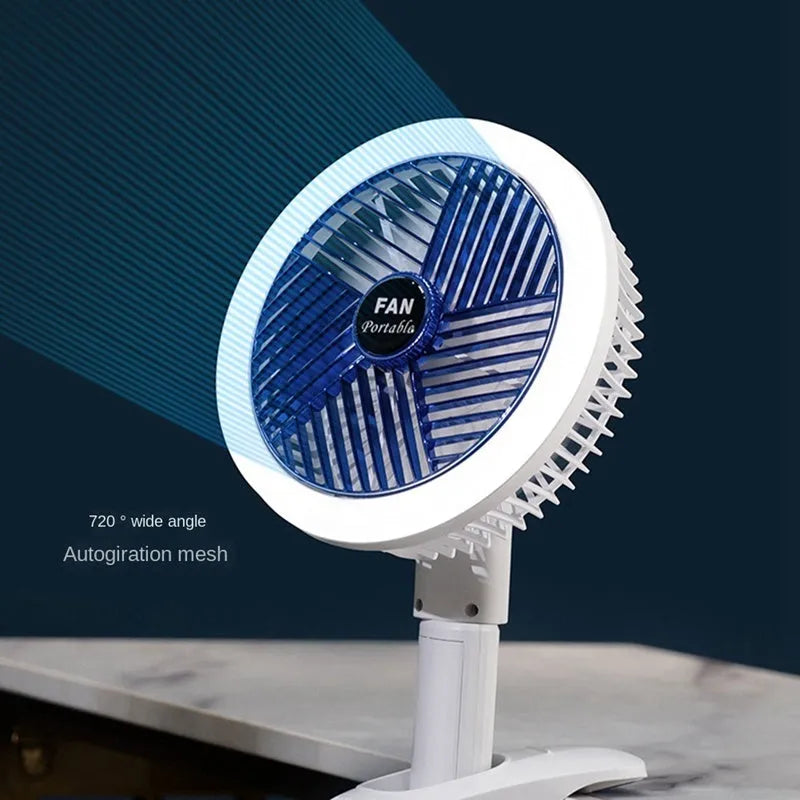 White and blue plastic rechargeable clip fan with USB cable, 29x18cm, clamped on a desk edge