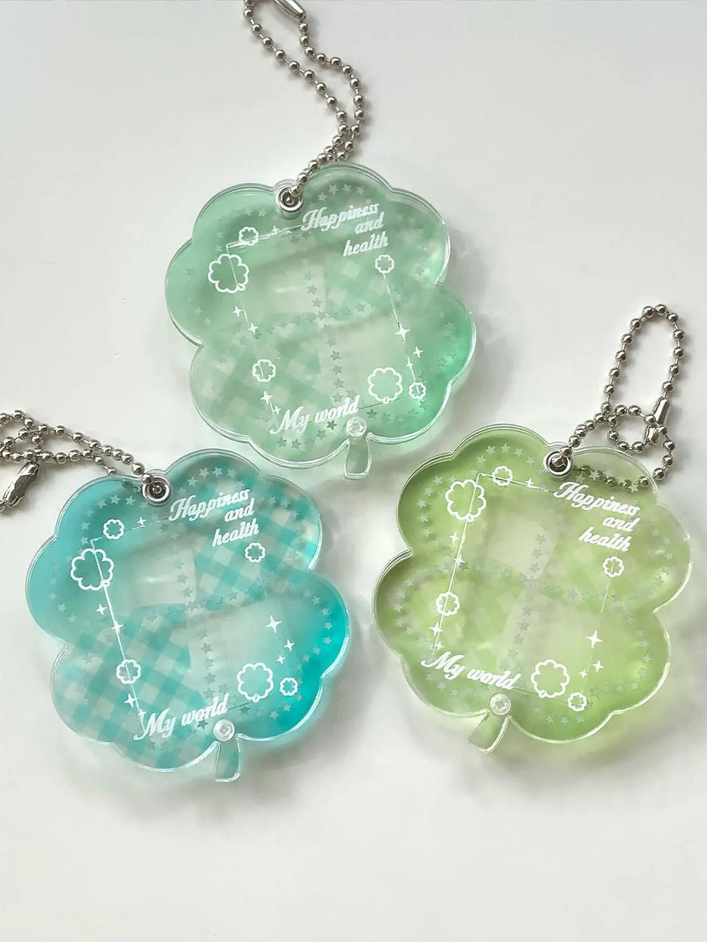 Acrylic four-leaf clover phone pendant keychain in blue, green, or mint