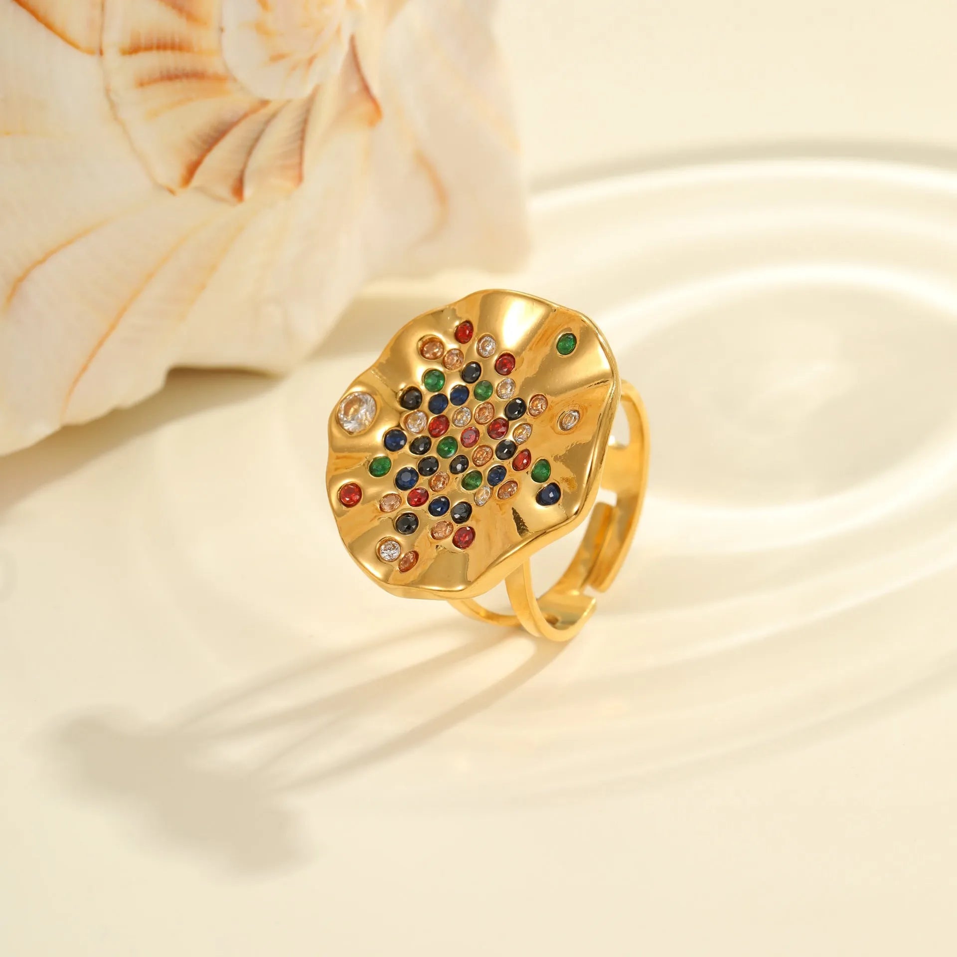 Geometric open mouth ring with pleated detailing and colourful crystal inlay on stainless steel