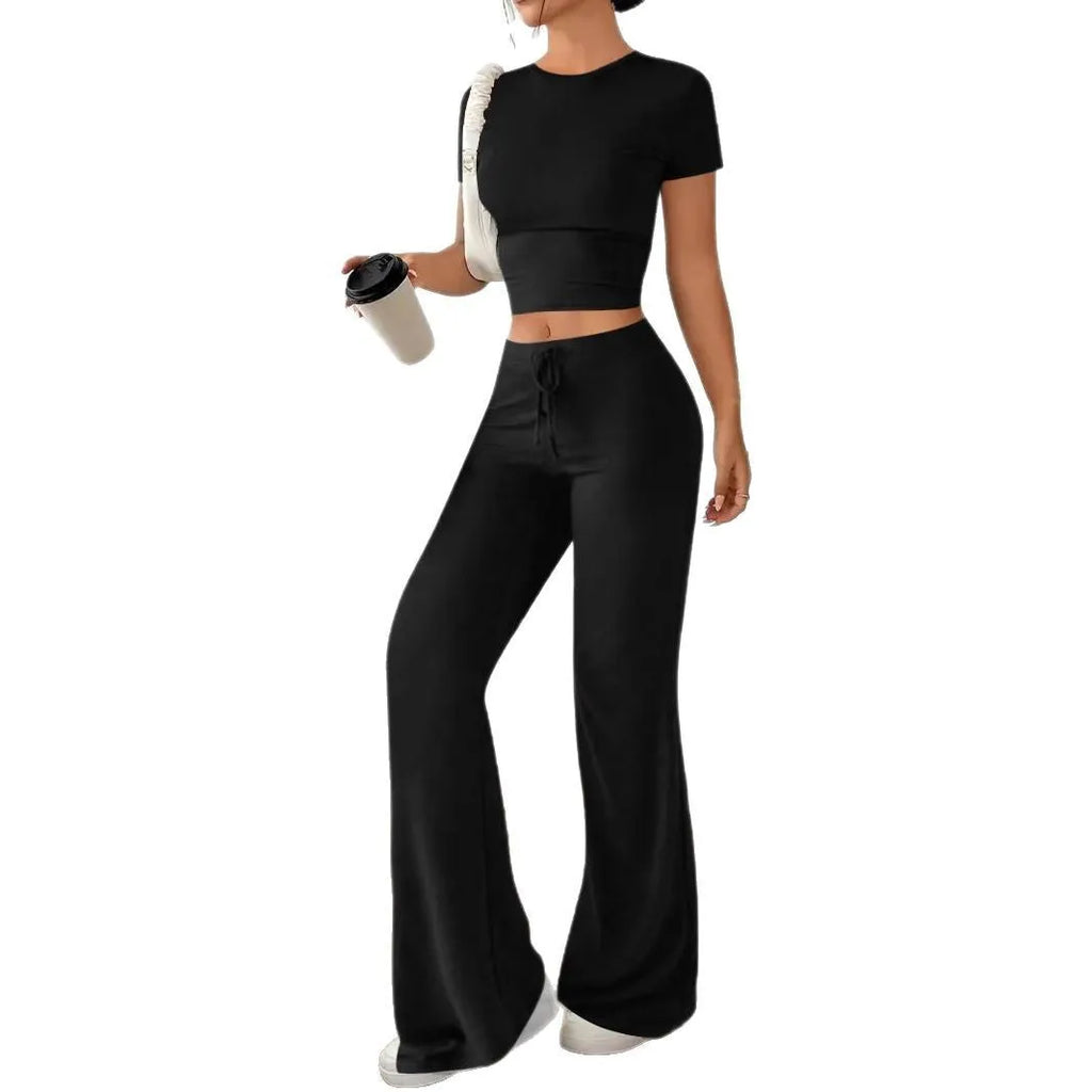 Black high waist trousers and short sleeve t-shirt women's co-ord set on a hanger