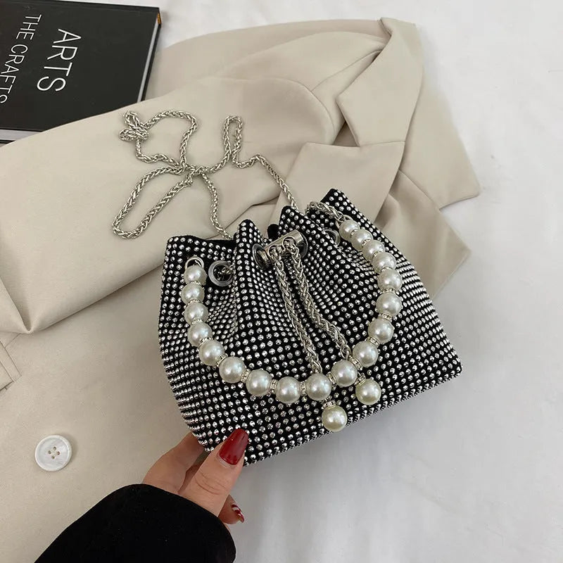 Women's light diamond shoulder bag with western chain strap in bucket shape