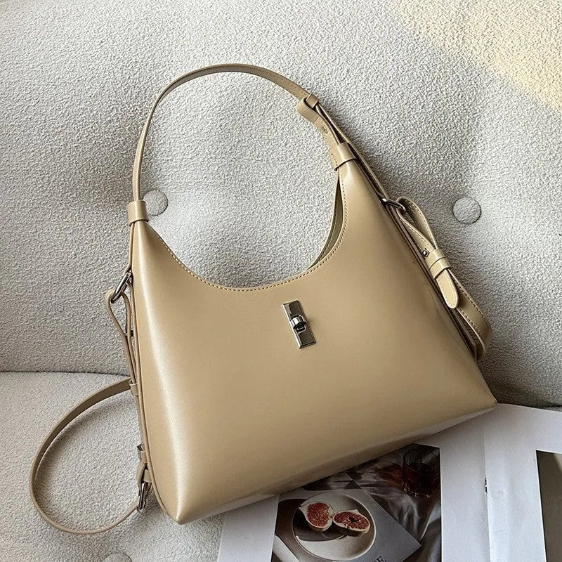 Genuine leather crossbody shoulder bag in dumpling shape with internal organiser compartments