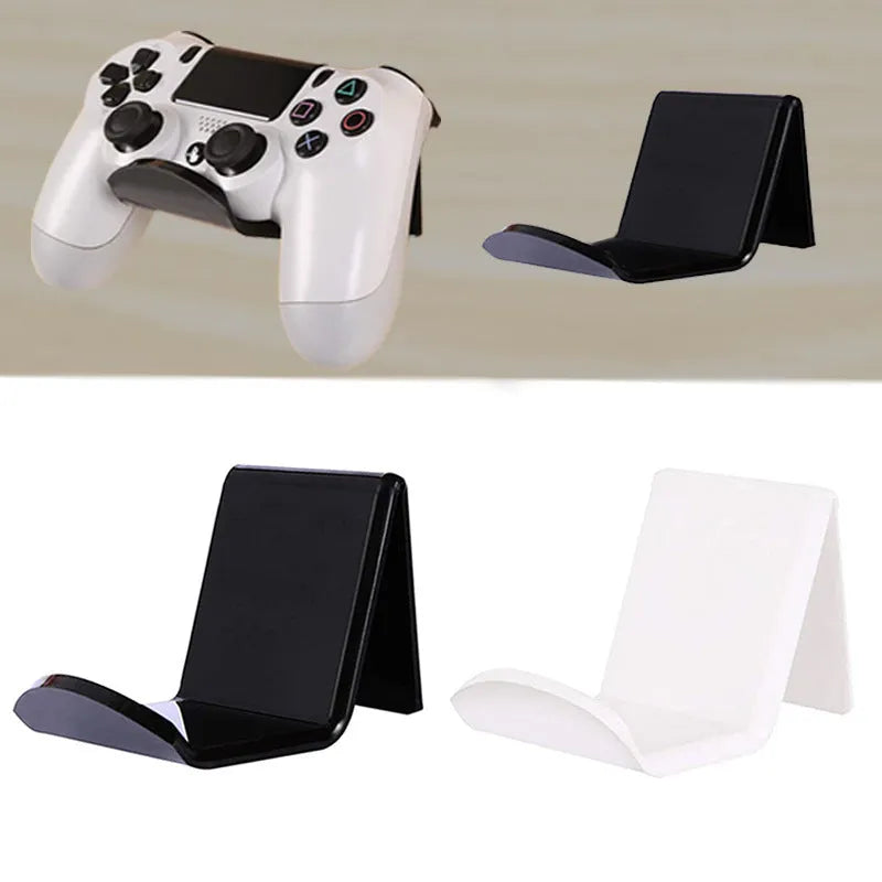 Universal plastic game controller bracket mounted on a wall in a choice of black, white, or transparent.