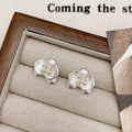 Women's retro flower fashion earrings in gold or silver colour with petal design