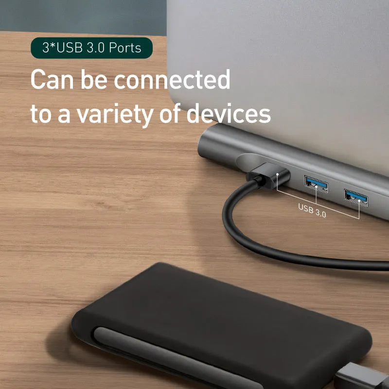 Grey aluminium alloy laptop docking station cooling bracket with ten-port connectivity hub.