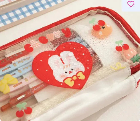 Transparent heart-themed pen case in pink cake rabbit or red love rabbit colour, showing Korean style design