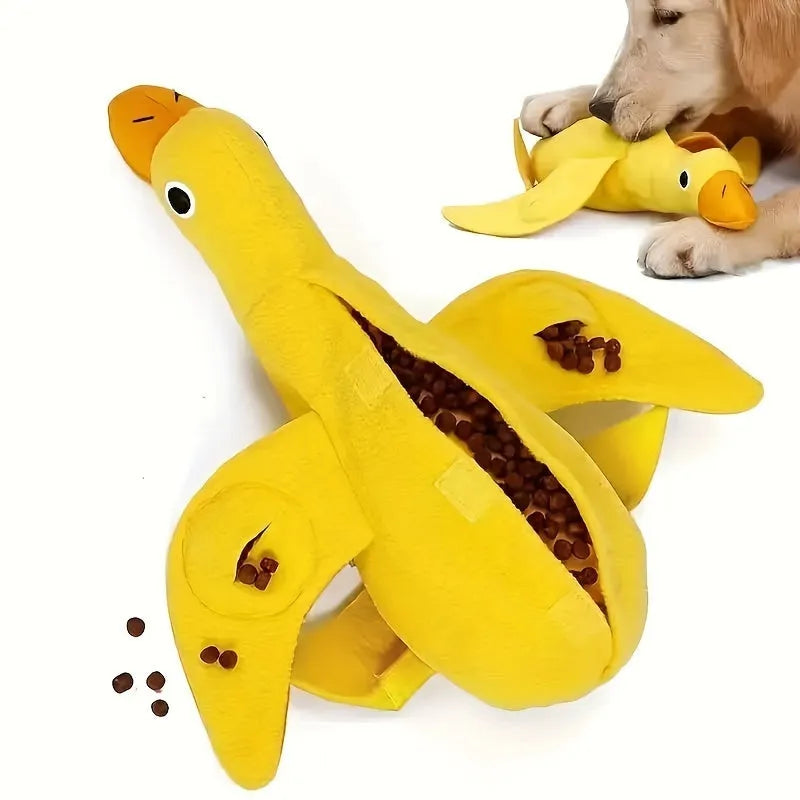 Yellow teddy fabric duck-shaped dog toy with squeaker and hidden food compartment