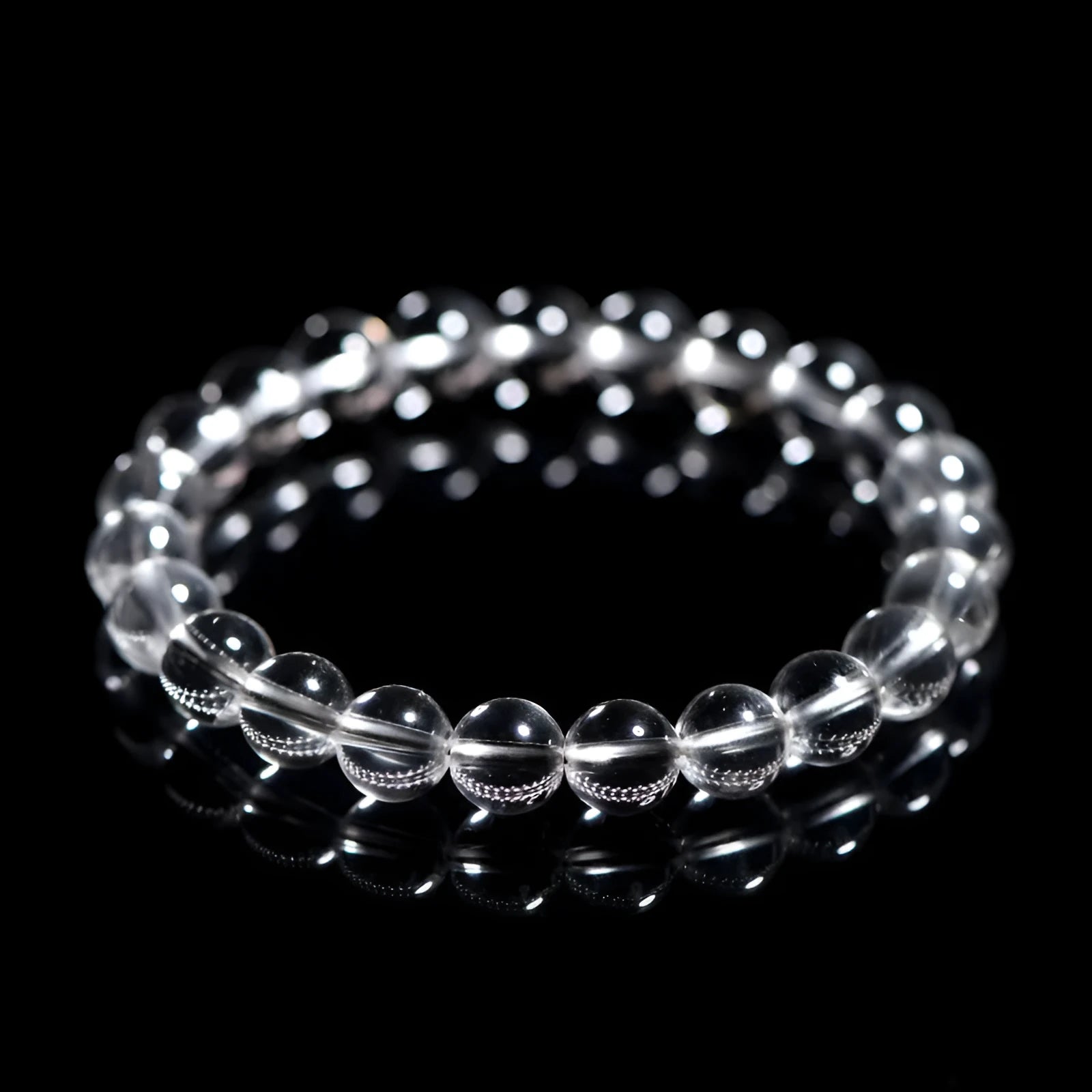 Natural Donghai Old Mine white crystal round bead bracelet on a wrist, showing geometric single circle design.