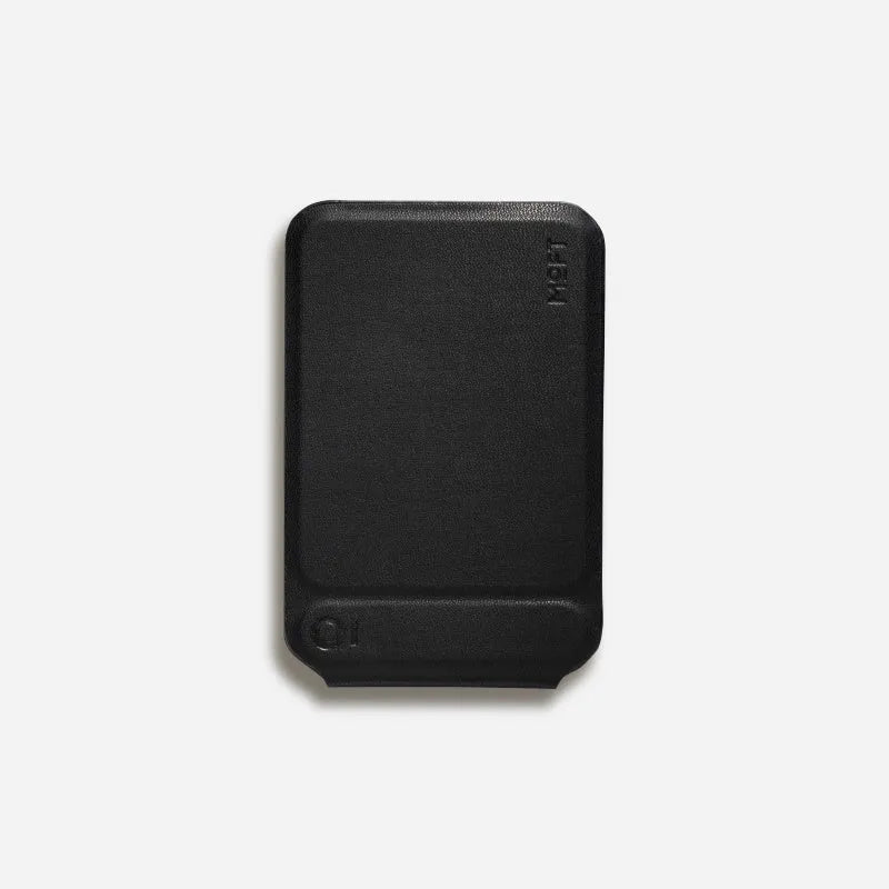 Black magnetic mobile phone holder case made from MOVAS leather and fibreboard, shown next to a phone.