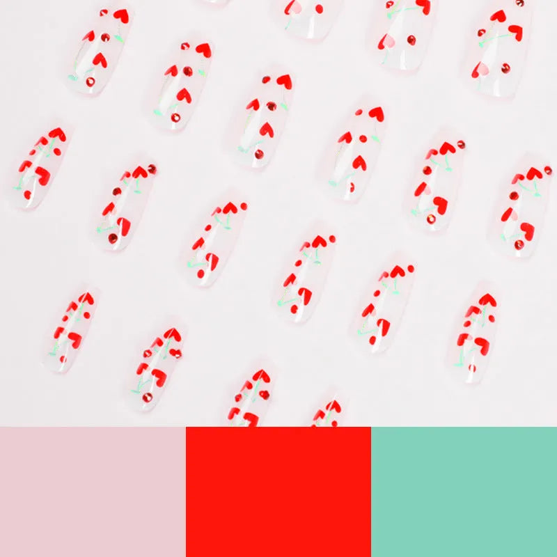 Red diamond and small cherry pattern French tip nail art stickers in a pack of 24 with adhesive glue.