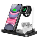 Folding 4-in-1 wireless charger showing iPhone, Apple Watch, and AirPods charging simultaneously in vertical stand orientation