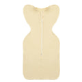 Newborn baby swaddled in bamboo fibre gauze sleeping bag with matching beanie in solid colour