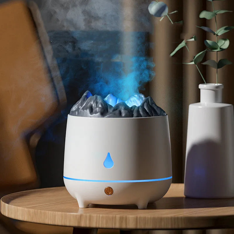Black volcanic sculpture USB humidifier and aromatherapy diffuser on a wooden surface.