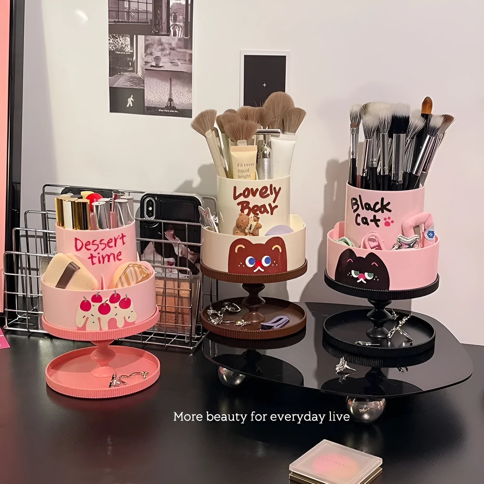 Rotating beige cosmetic brush storage barrel with 18-litre capacity and a separate storage rack on a table.