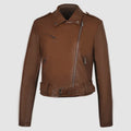 Women's black PU leather motorcycle-style jacket with lapel collar and waist belt on a hanger