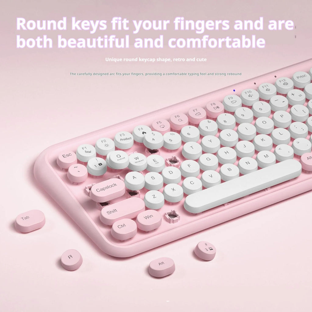 Pink wireless Bluetooth keyboard with 84 keys measuring 339mm wide