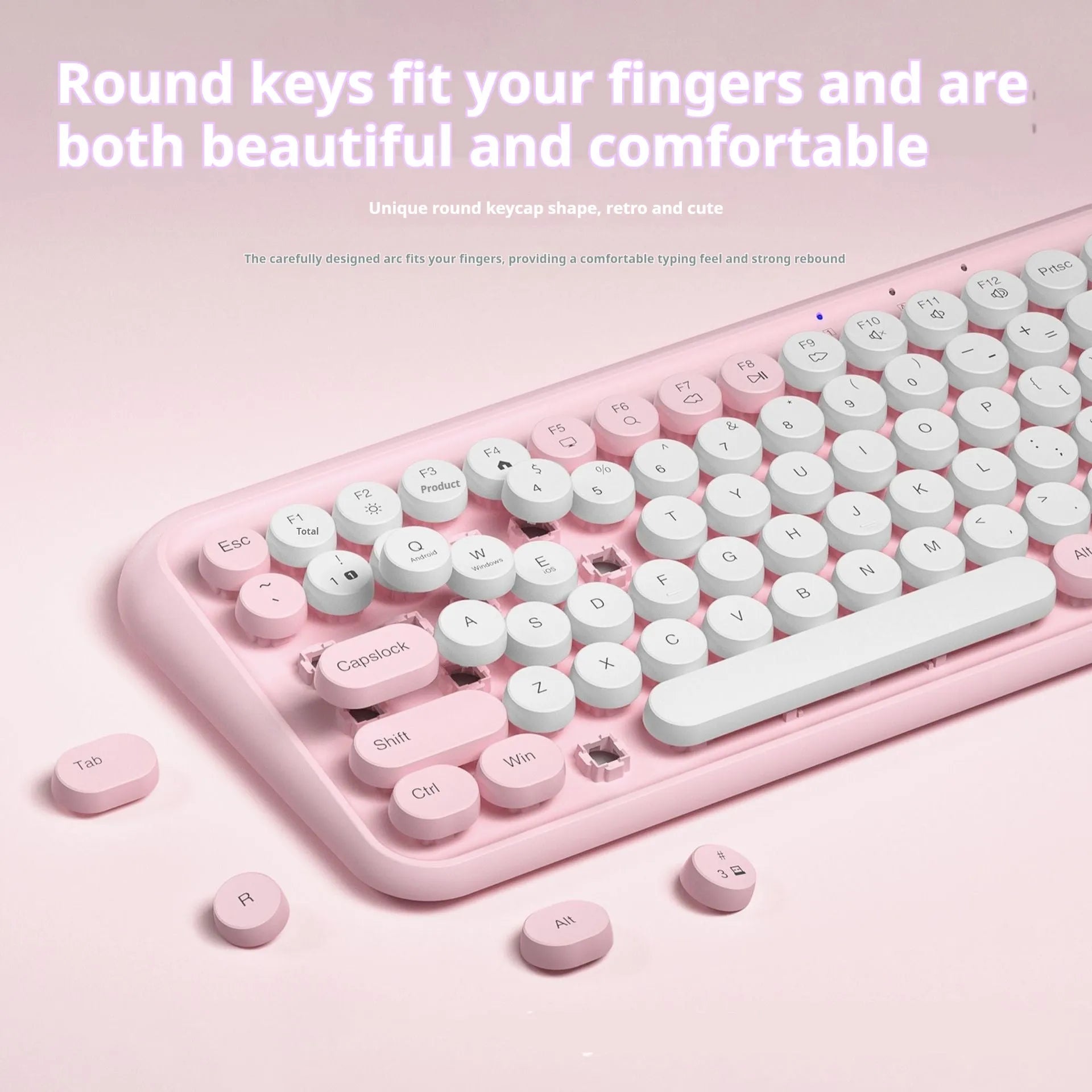 Pink wireless Bluetooth keyboard with 84 keys measuring 339mm wide