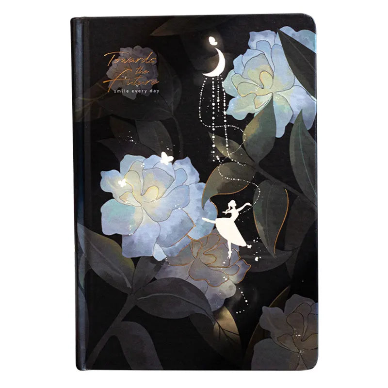 A5 notebook with luminous blue cover open to show colour illustration pages inside