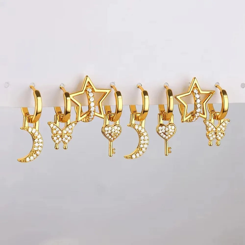Women's copper earrings with geometric butterfly designs in heart, bow, and star shapes