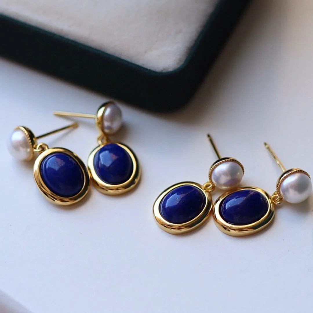 A pair of simple lapis lazuli pearl dangle earrings in 925 sterling silver with auspicious patterns.