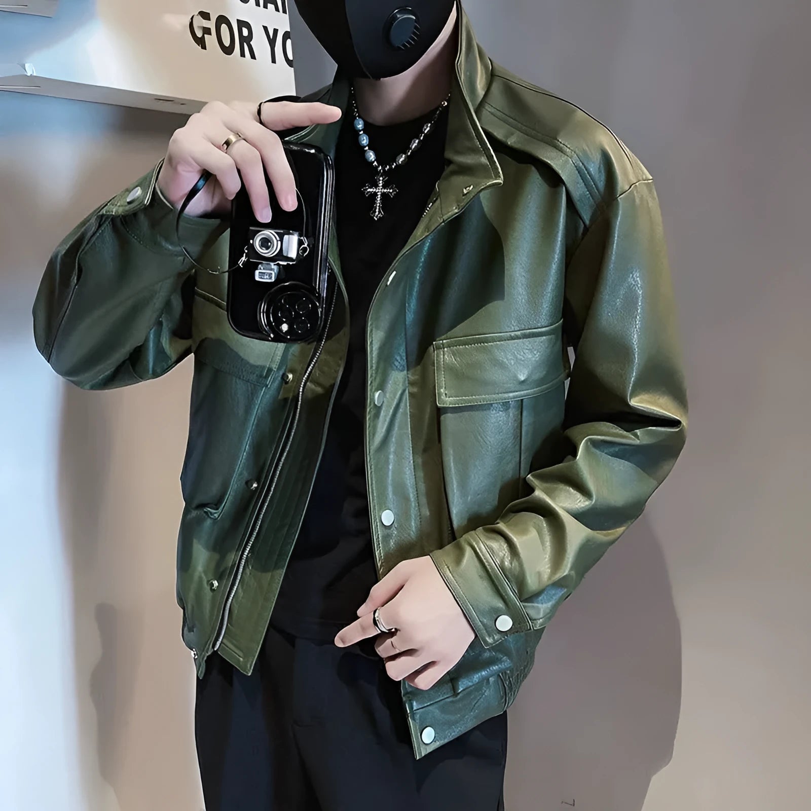 Men's black PU leather pilot jacket with side pockets and straight hem.