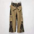 Women's high-waist straight-leg jeans with leopard print on dark khaki denim and contrast stitching details