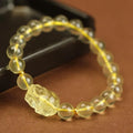 Yellow leather bracelet with citrine artificial crystal beads and Pi Xiu charm in Chinese national style