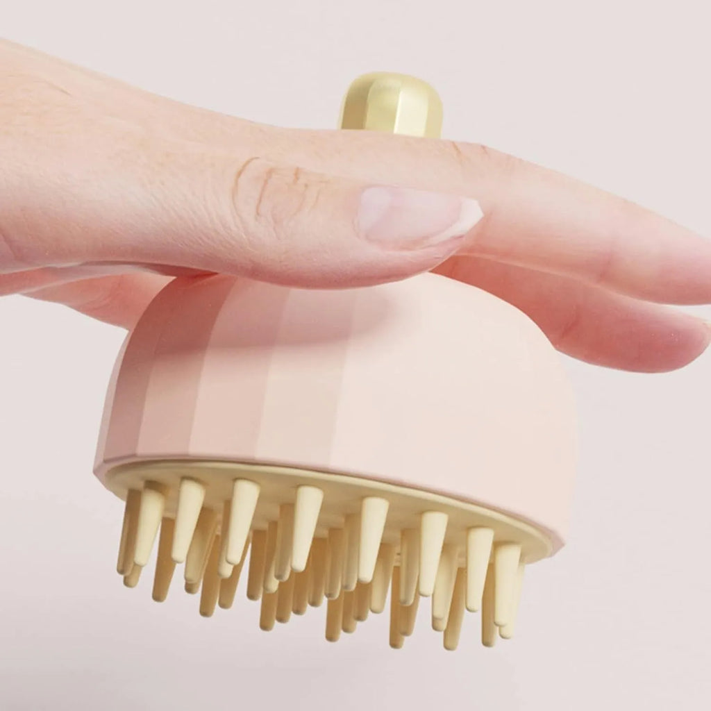 Green pet bath massage brush with drainage holes for dogs and cats during shampooing